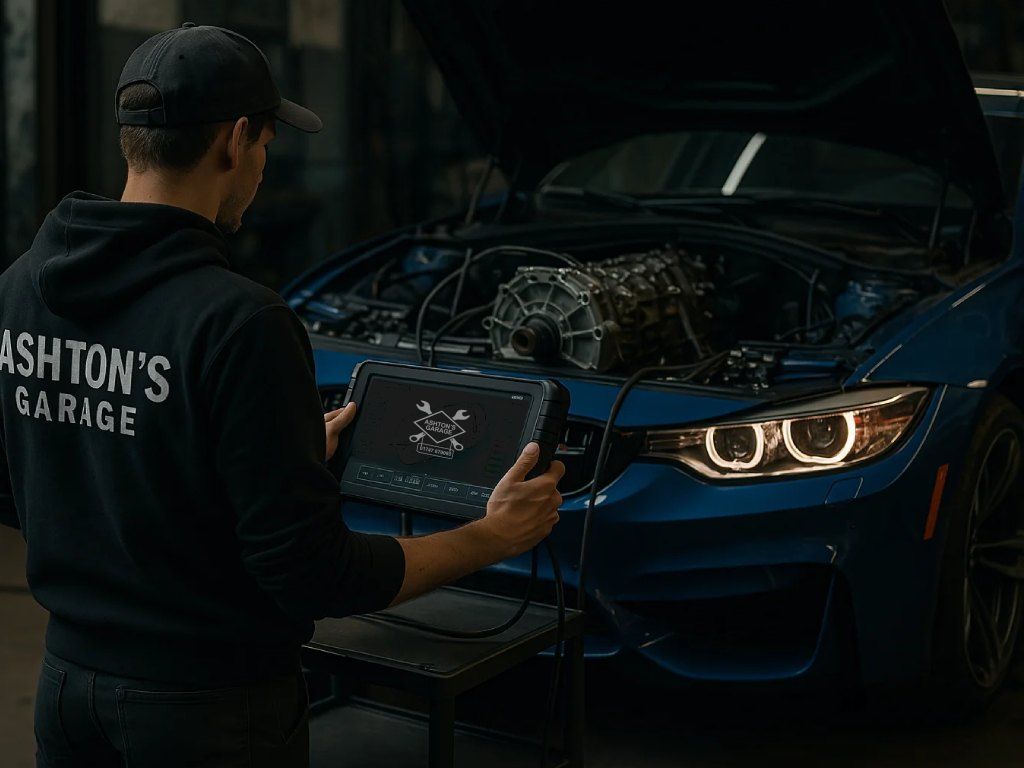 Ashton's mechanic using diagnostic equipment on a BMW